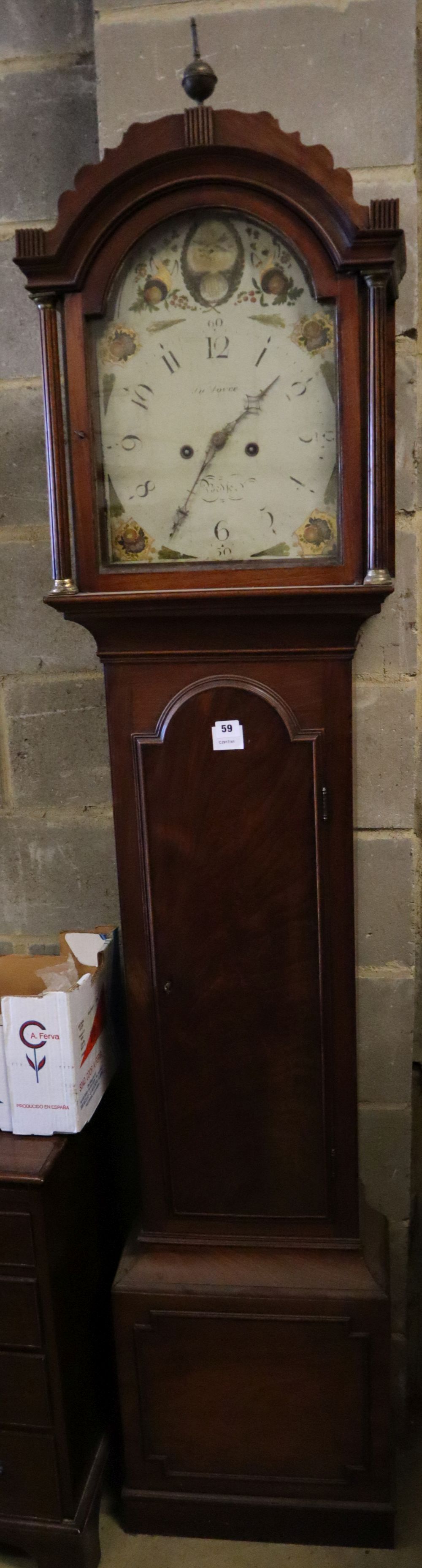 A George III mahogany eight day longcase clock, the painted arched dial signed J.N. Joyce of Bedford, width 45cm height 217cm